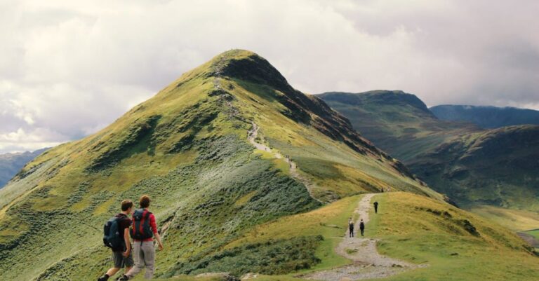 Views - People Standing on Top of Mountain