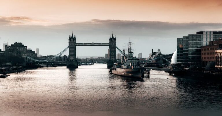 Landmarks - Black Boat Beside Bridge