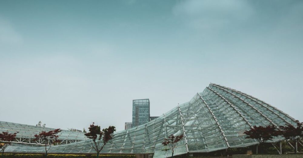 Museums - A large glass building with a large glass roof