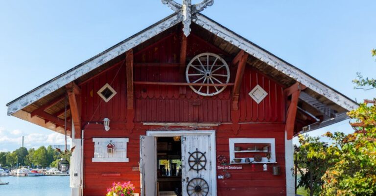 Hideaways - A red building with a clock on it